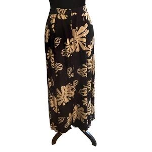 Zachi woman’s black and floral maxi skirt, size small